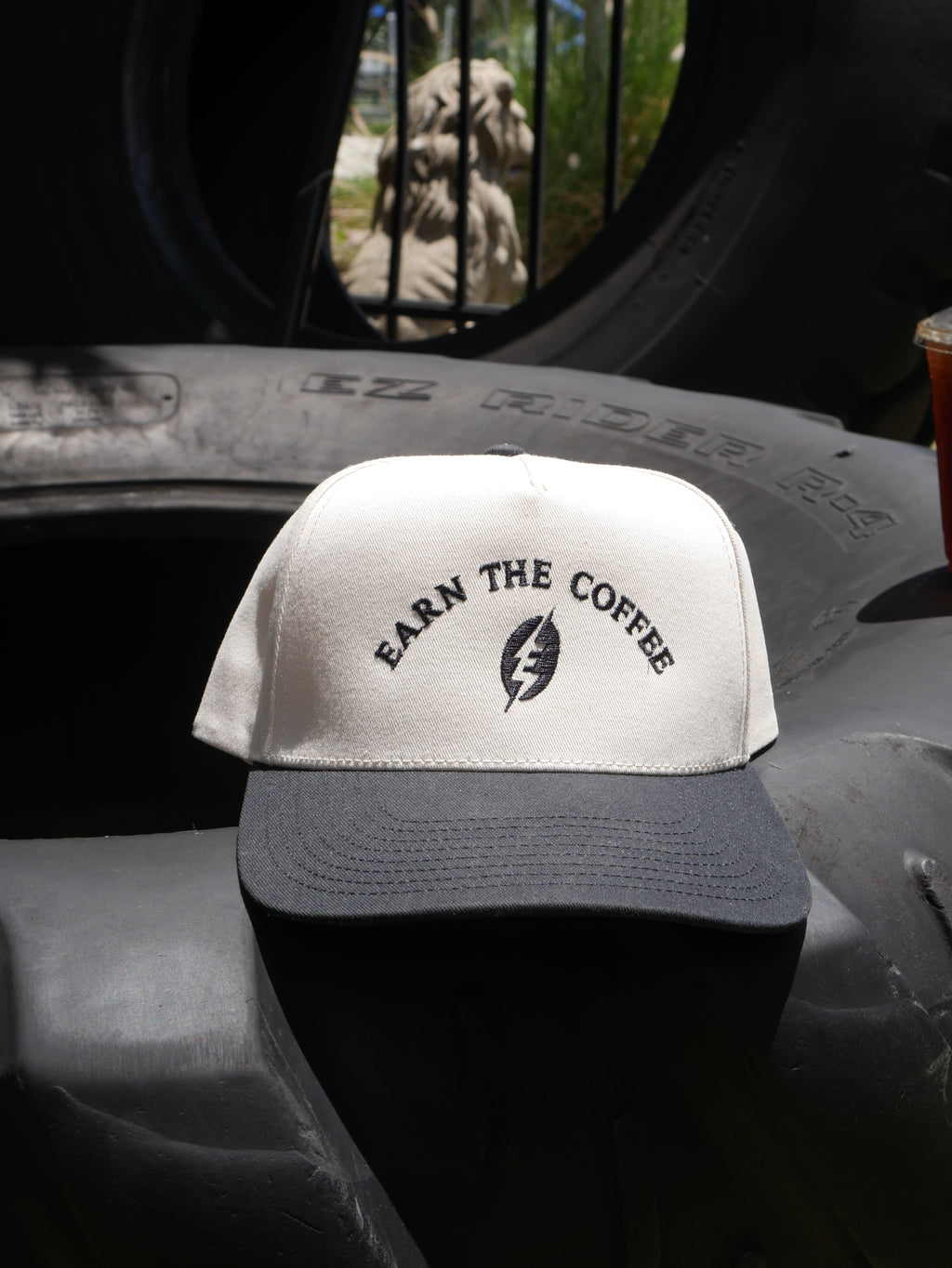 Earned It Trucker Hat