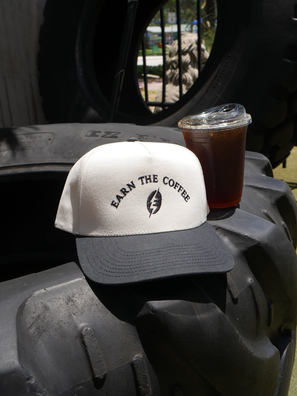Earned It Trucker Hat