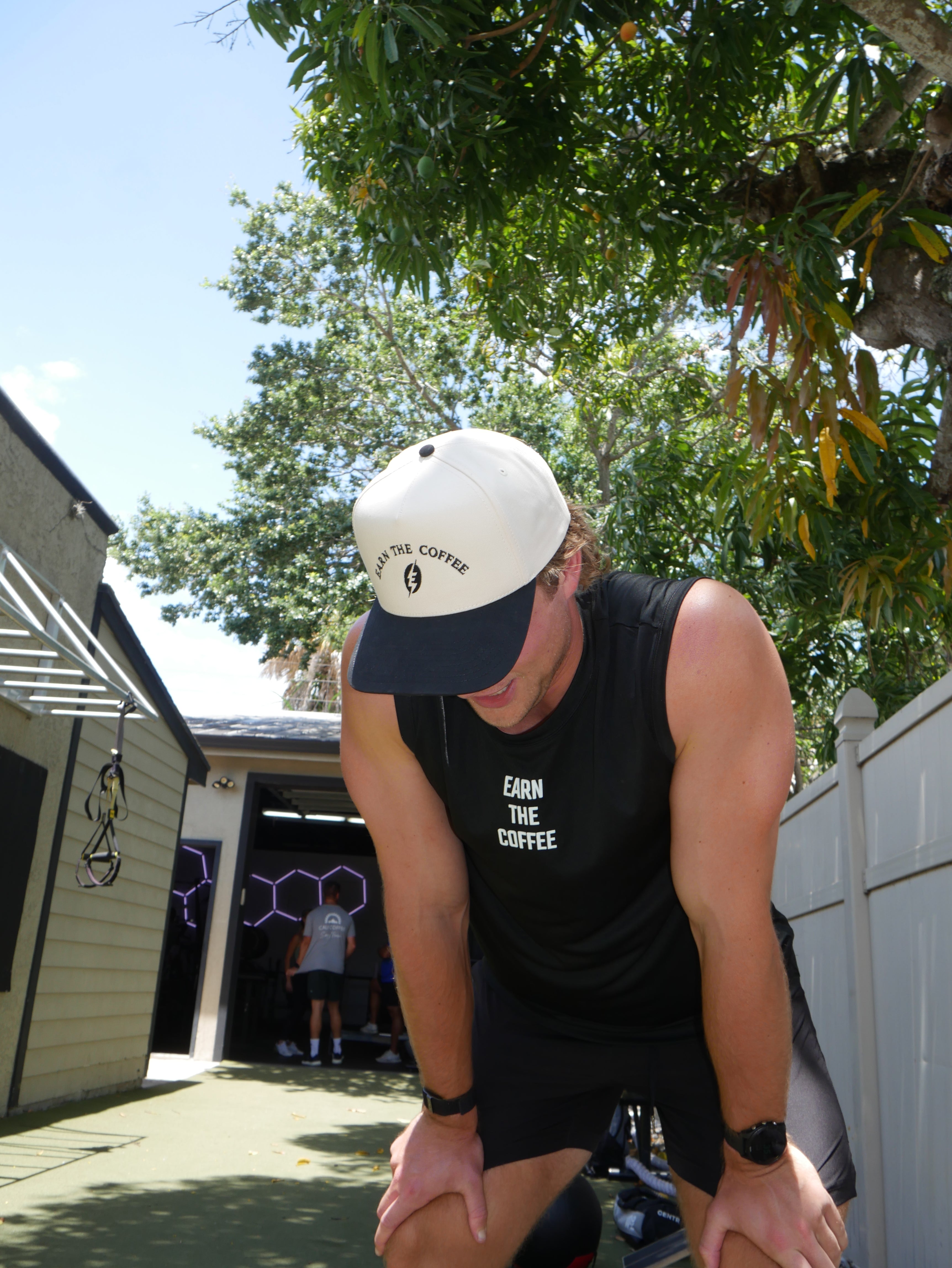 Earned It Trucker Hat