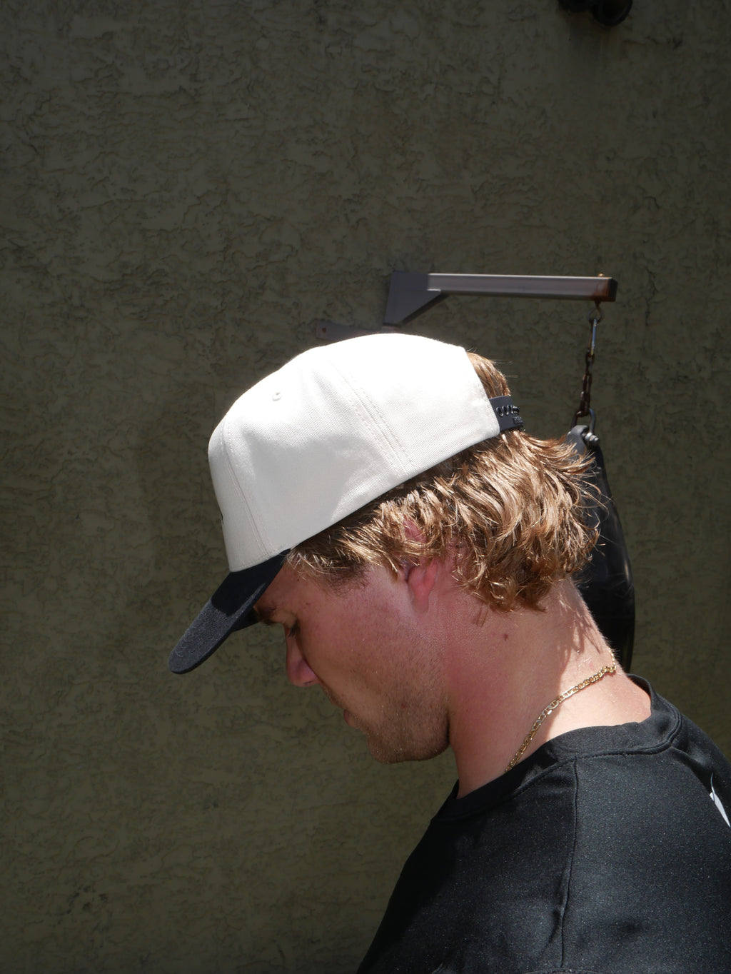 Earned It Trucker Hat